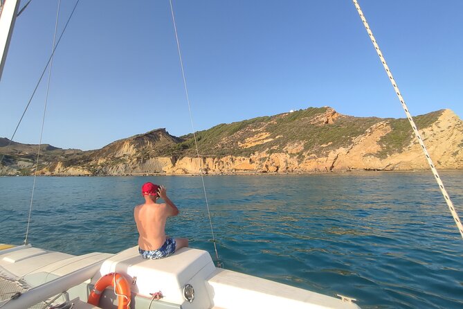 4 Hours Catamaran Tour to the Scala dei Turchi - Capo Rossello and the lighthouse above the sea