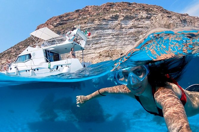 7 hours Boat trip to Lampedusa lunch, SUP and Snorkeling - Why a boat is the best way to see Lampedusa