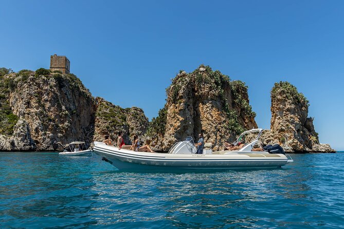 8-Hour Boat Tour from Castellammare del Golfo to San Vito Lo Capo - Cala Rossa and fish-filled water