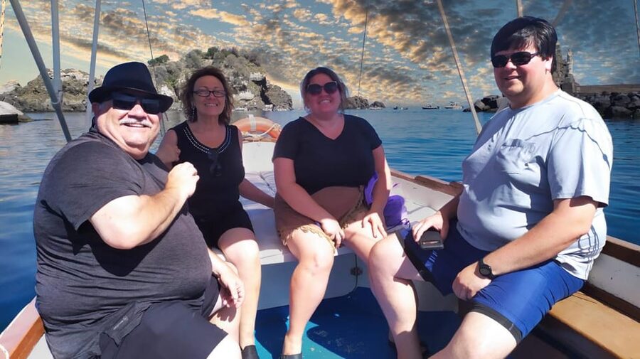 Aci Trezza boat tour sunset and dinner sicilian family home - The ride to Acireale and a family dinner