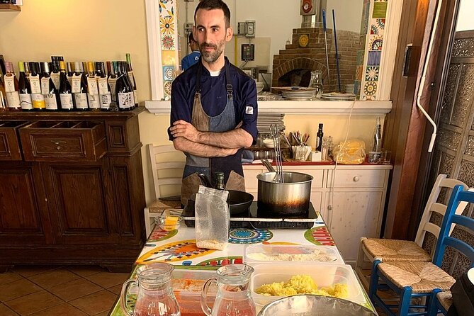 Arancino Making Class in Taormina - Sitting down with wine, dessert, and limoncello