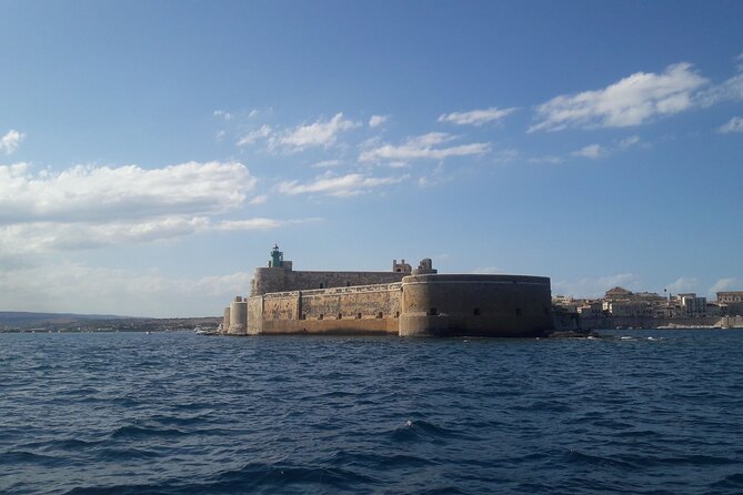 Boat Excursion to Ortigia with Typical Homemade Lunch - Seeing Ortigia from the water at 1:00 pm