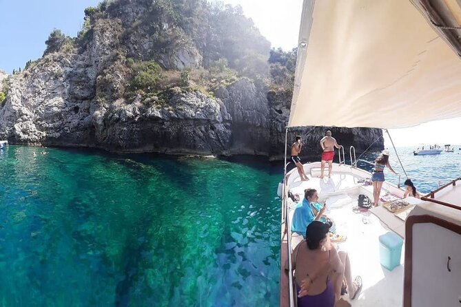 Boat tour Giardini Naxos Taormina Isola Bella Blue Grotto - Sailing past Mazzarò Beach