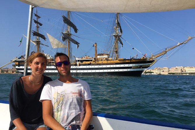 Boat tour of Ortigia Island and sea caves - The guide can make this short tour much better