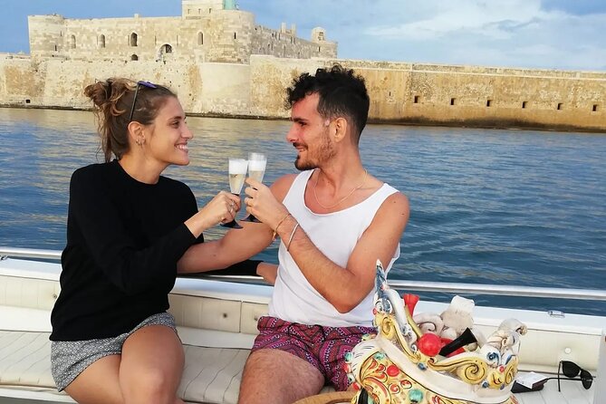 Boat tour of Ortigia, sea caves, Pillirina and snorkeling - Why seeing Syracuse from the water is worth your time