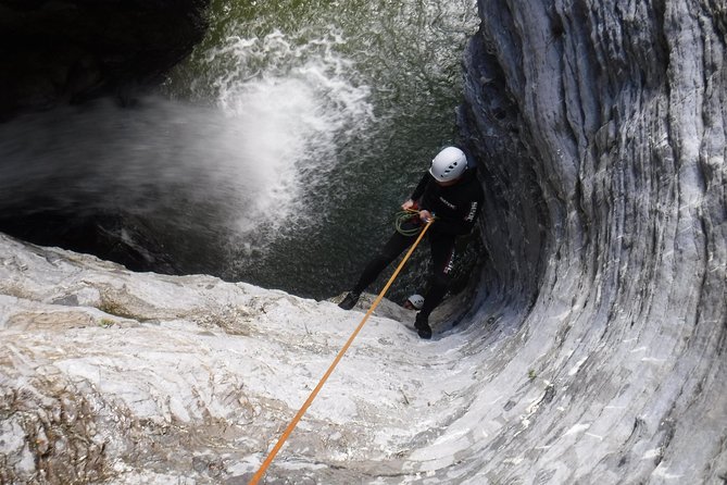 Canyoning at the foot of Etna - Entering a canyon below Mount Etna
