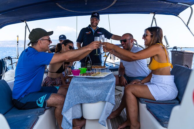 Catania boat tour along the coast with aperitif and snorkeling - Aci Trezza and the fishing-village feel