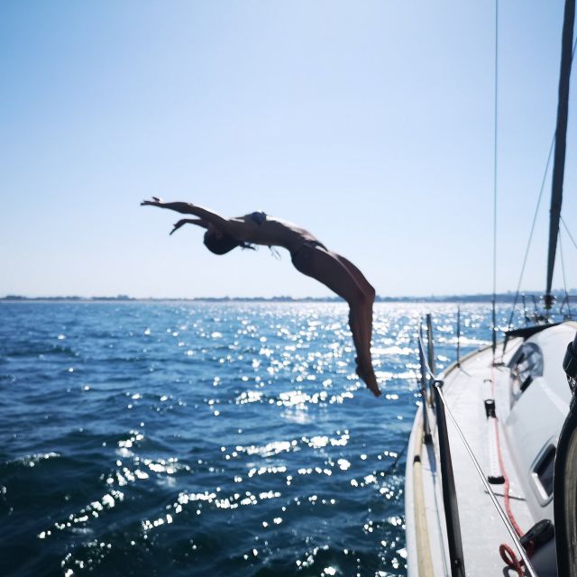Catania: Coastline Sailing Trip 6hr with Aperitif and Lunch - The Cyclops Islands and Faraglioni