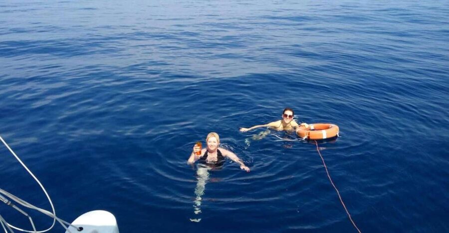 Catania: Sailing Tour with Lunch - Swimming in water reached by boat