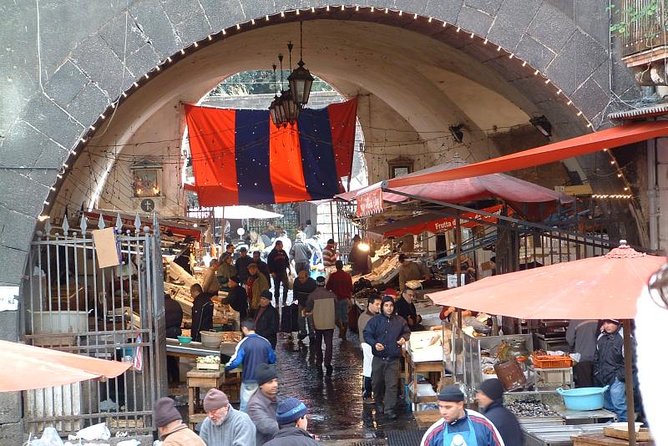 Catania Street Food Tour - Cheese, olives, and oil at the fish market