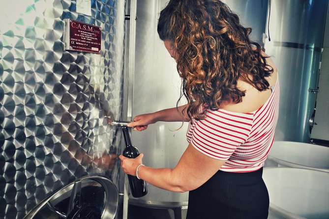 Create Your Perfect Blend with Our Wines. - Filling and labeling your own bottle