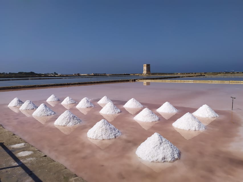 Discover Trapani's Saltpans with an E-Bike Tour - Ending with salt from the production
