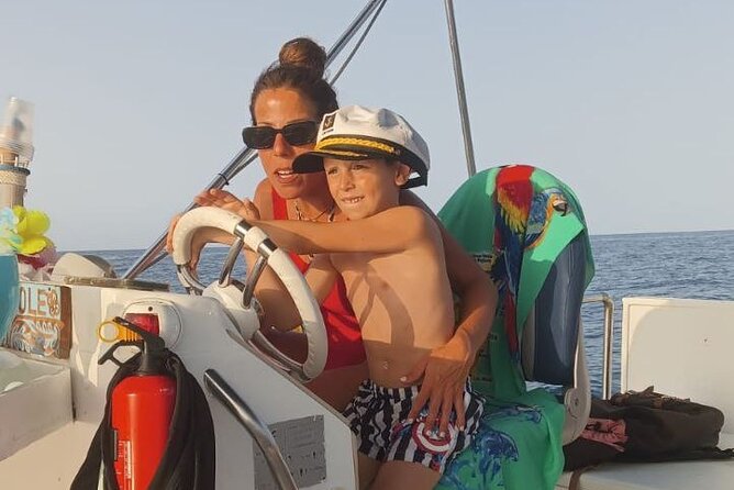 Discovering Cefalù's Coastline Activity on a Mini Catamaran - The Cefalù coastline from the water