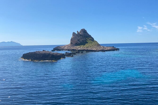 Egadi Shuttle Tour to Favignana and Levanzo from Trapani - Levanzo from the water, with a swim stop