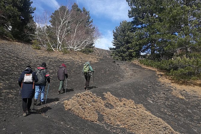 Etna and Taormina con pranzo - The volcanic cave stop, with helmets and torches