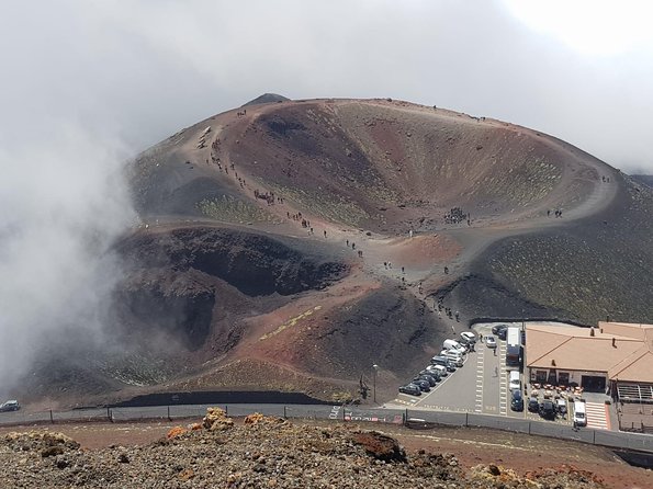 Etna Excursion 4X4 Jeep Tour in the morning - Live an adventure! - Entering a lava cave with helmet and torch