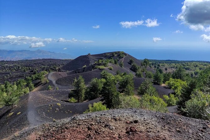 Etna excursion and wine tasting with Sicilian lunch - Entering Grotta dei Ladroni with helmet and torch
