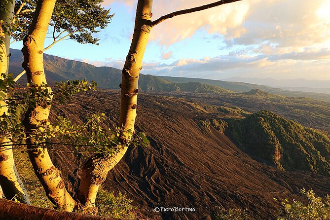 Etna Sunset Tour - Entering an Etna lava cave