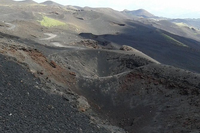 Etna trekking tour - Descending through ash, lapilli, and volcanic sand
