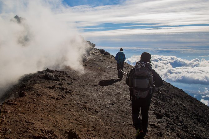 Etna Volcano: South Side Guided Summit Hike - Walking across Etna’s black volcanic sand
