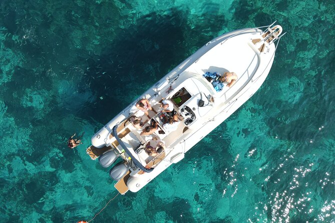 Favignana and Levanzo, Egadi islands tour by boat from Trapani - Cala Azzurra starts the swimming day