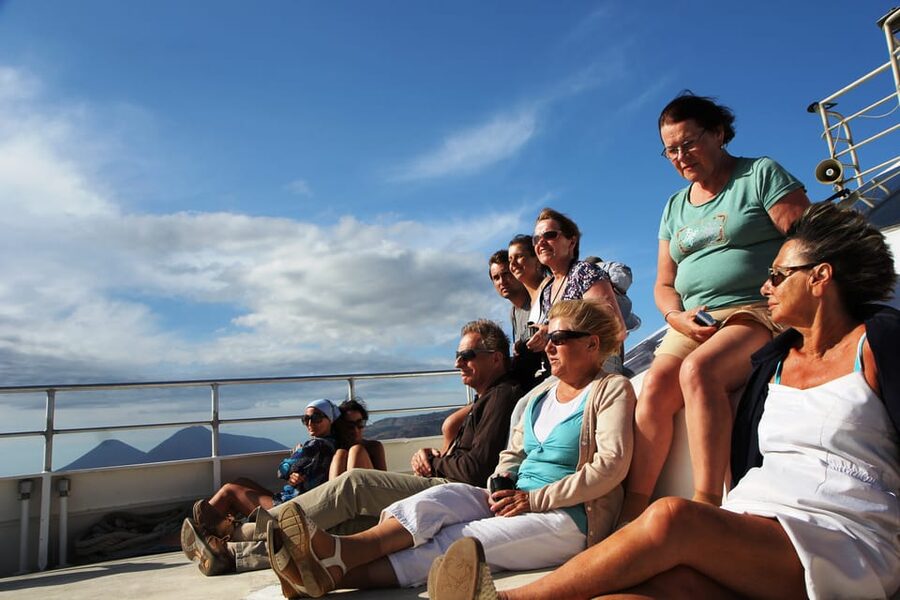 From Capo D'Orlando: Lipari and Vulcano Tour with Boat Trip - The guide, boat, and onboard expectations