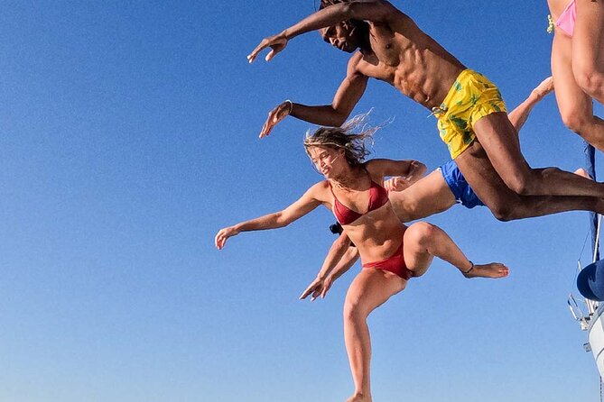 Full Day on board with lunch in luxury private tour - Swimming and Snorkeling in Clear Water