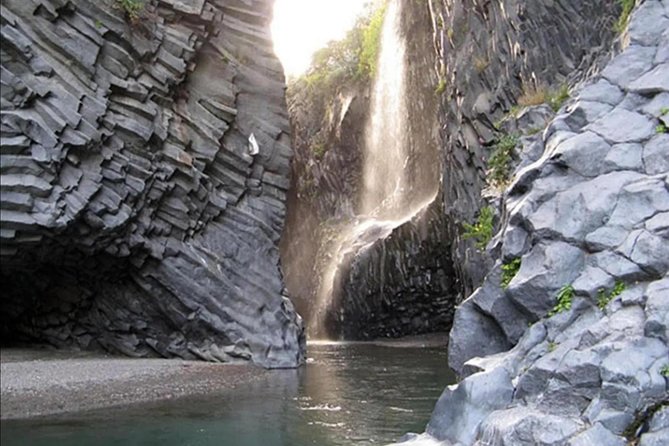Full day tour of Etna and Alcantara - Alcantara Gorges, cold water, and dark basalt walls