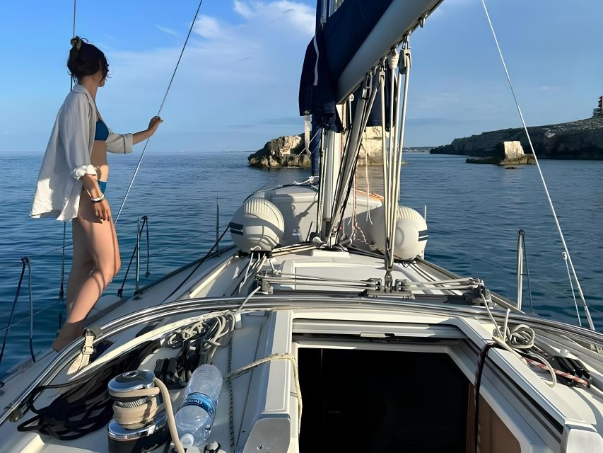 Giardini Naxos and Taormina sailing tour - Leaving Giardini Naxos on a small sailboat