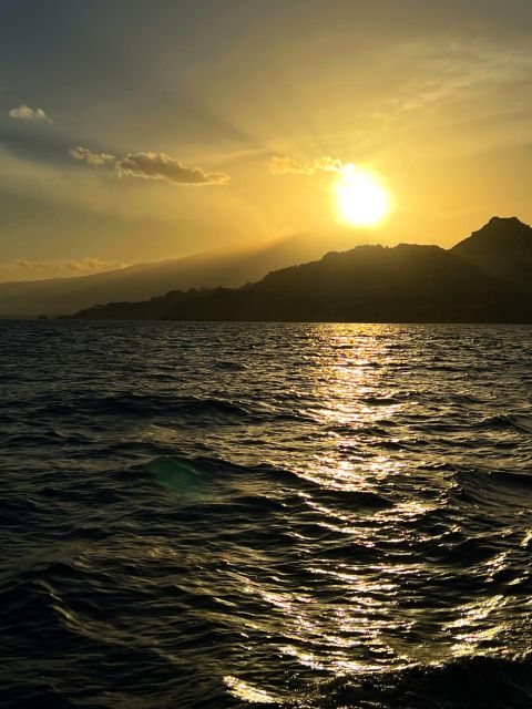Giardini Naxos Taormina: Dolphin Watching Sunset Tour - Sicilian snacks, prosecco, and music