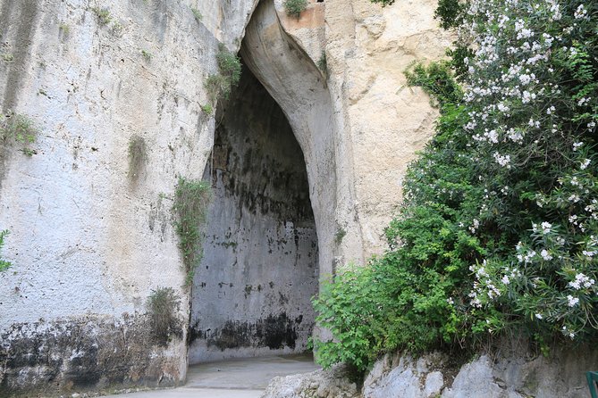 Group guided tour of the archaeological park of Neapolis - The Greek theater and the seasonal cover