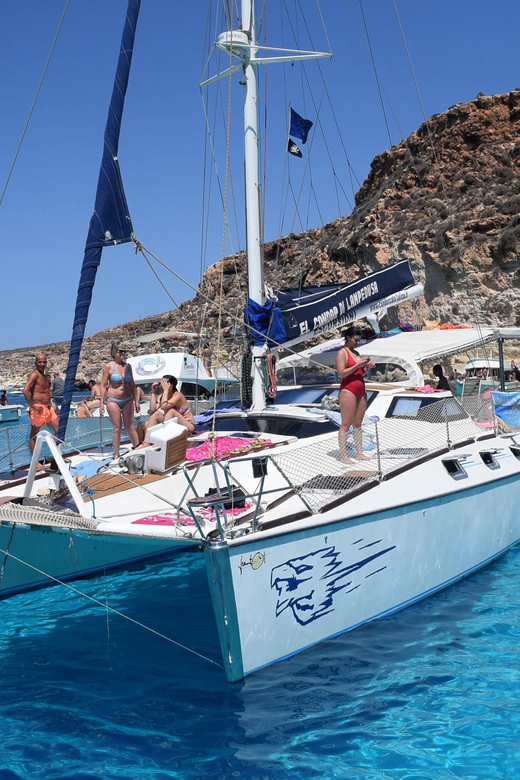 Lampedusa: Dolphin watching with aperitif at sunset - A Sunset Swim in a Quiet Cove