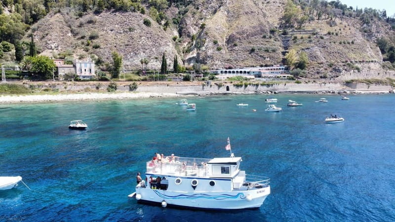 Mini-cruise Isola bella with snorkeling from Giardini Naxos - Sailing across the Bay of Naxos