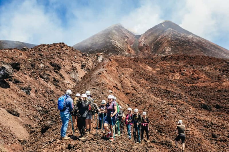Mount Etna: Summit Trek with Cable Car and snack included - Descending through craters from recent eruptions