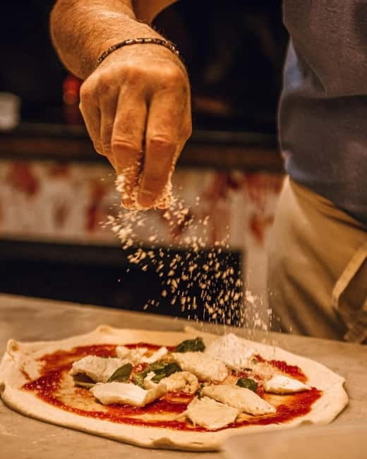 Palermo: Pizza & Tiramisu Class with Free Flowing Fine Wine - Shaping a Margherita with quality ingredients