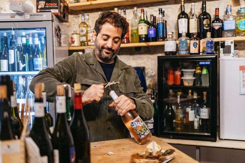 Palermo: Wine Tasting with Snacks at Bottega Monteleone - Bottega Monteleone’s colorful setting