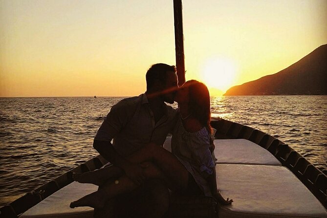 Private Boat Tour at Sunset to the Faraglioni of Lipari - Reaching the Faraglioni as the light changes
