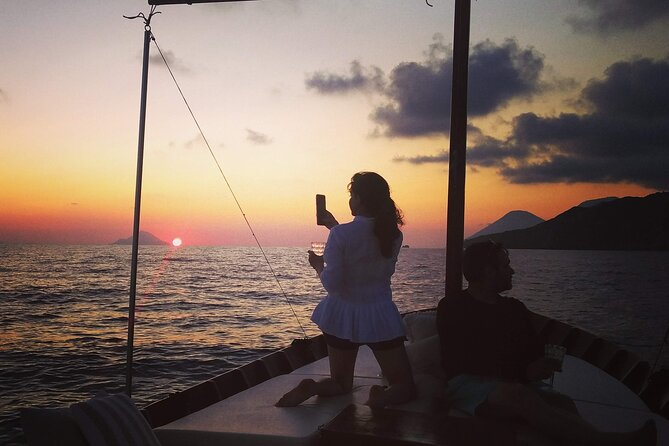 Private Boat Tour at Sunset to the Faraglioni of Lipari - A wooden gozzo with room for six