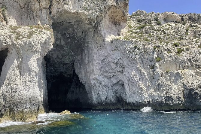 Private tour with fish products and Full Drinks - Ortigia’s historic shore from the water