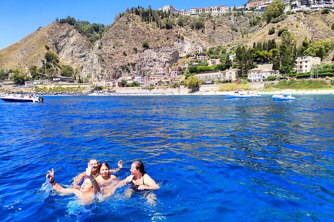 Sicilian wine tasting on the boat in Taormina - Sirene Bay, shallow water, and sea grass
