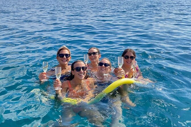 Sicilian wine tasting on the boat in Taormina - Isola Bella, the main swimming stop