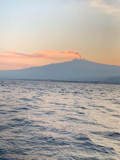 Sunset tour in search of dolphins with aperitif - From Capo Taormina to Isola Bella