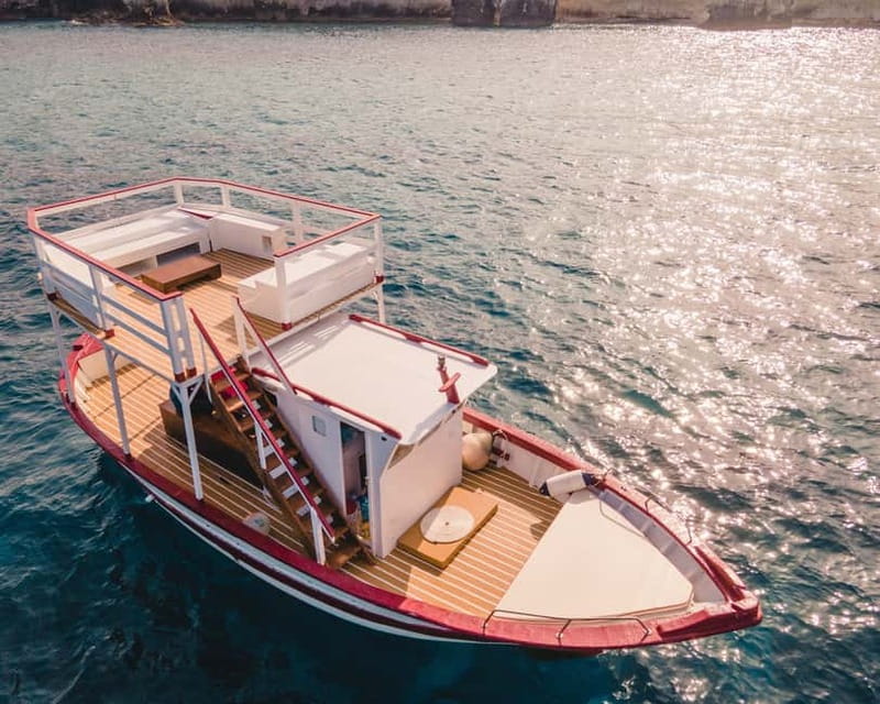 Syracuse: Boat Trip with Lunch, Wine, and Swimming Stops - Guides, captains, and the feel of the boat