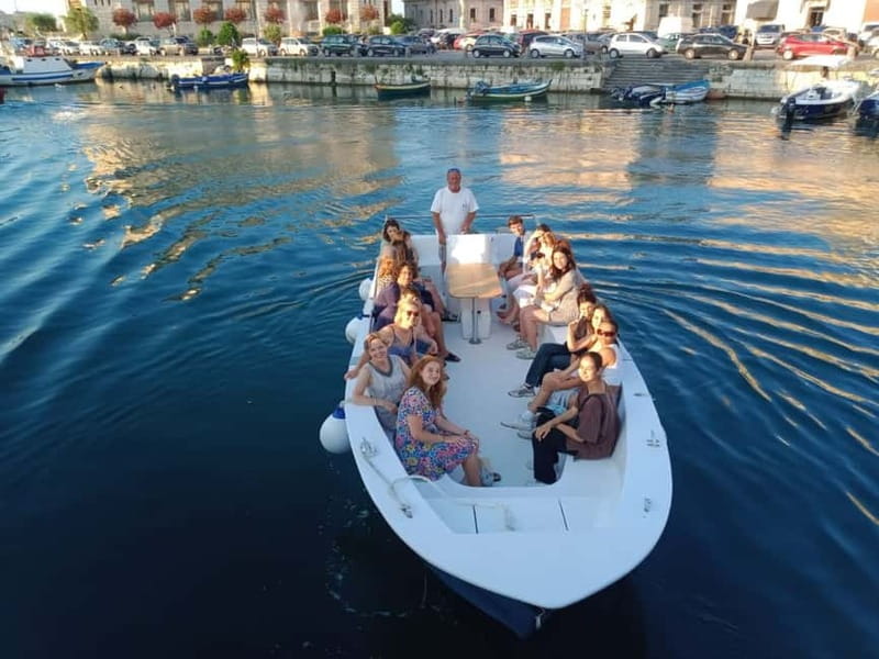 Syracuse: Ortigia Island and Sea Caves Boat Tour with Drinks - The Fonte Aretusa swim stop