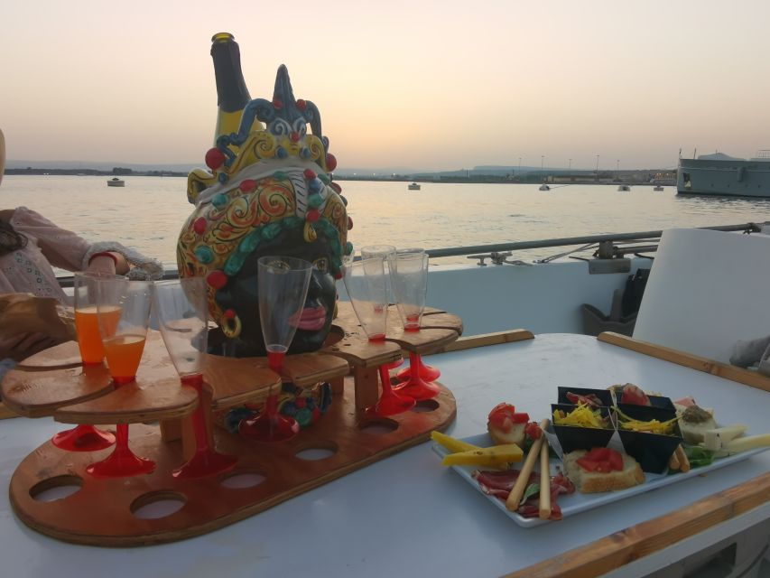 Syracuse: Ortigia Sunset Cruise with Aperitif - Grotta dell’Amore and the Included Photos