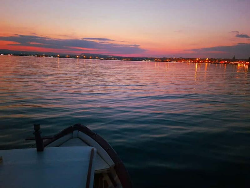 Syracuse: Sunset cruise including aperitif and swim stop - Circling Ortigia’s historic waterfront