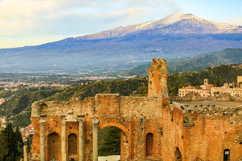 The Greek theatre at Taormina with Etna smoking behind it