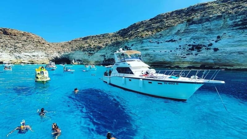 Taormina: Boat Tour with Aperitif on Isola Bella - Entering the Blue Grotto Near Mazzarò