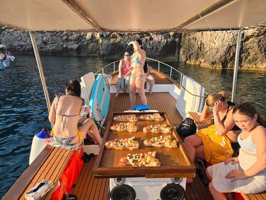 Taormina: Boat Tour with Sicilian Wine Tasting - What the crew adds to the experience