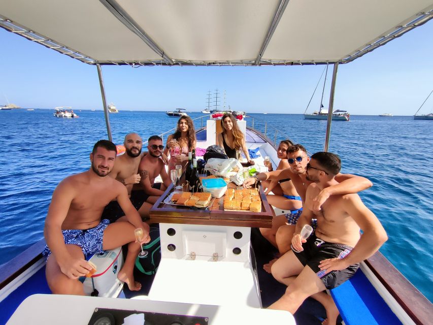Taormina: Coastal Highlights Cruise with Wine & Food Tasting - Comfort, music, and the pace of the boat